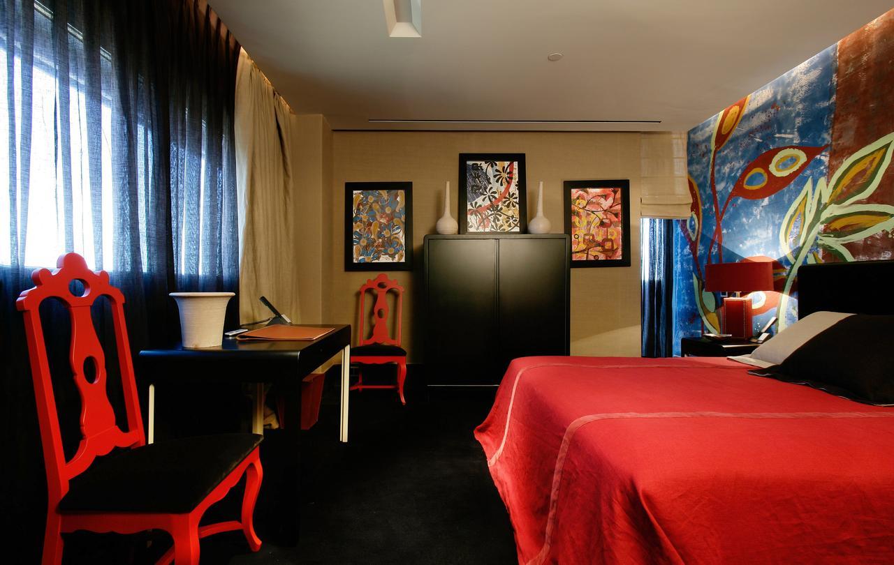 Hotel Puerta America Madrid Esterno foto A room at the hotel